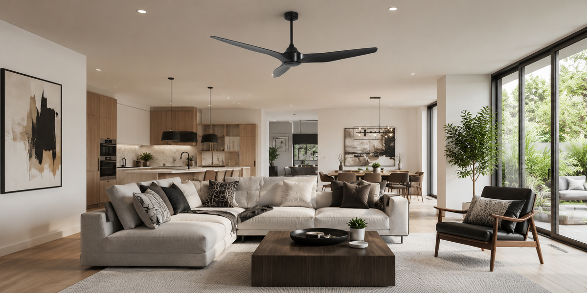 Modern black large ceiling fan mounted in a bright, contemporary living room.